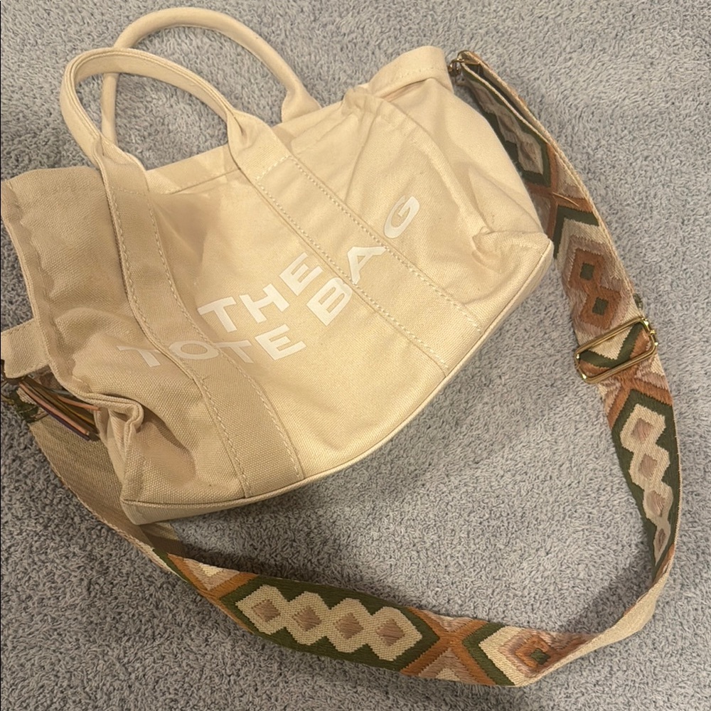 Stylish Cream Tote Bag with Patterned Strap
